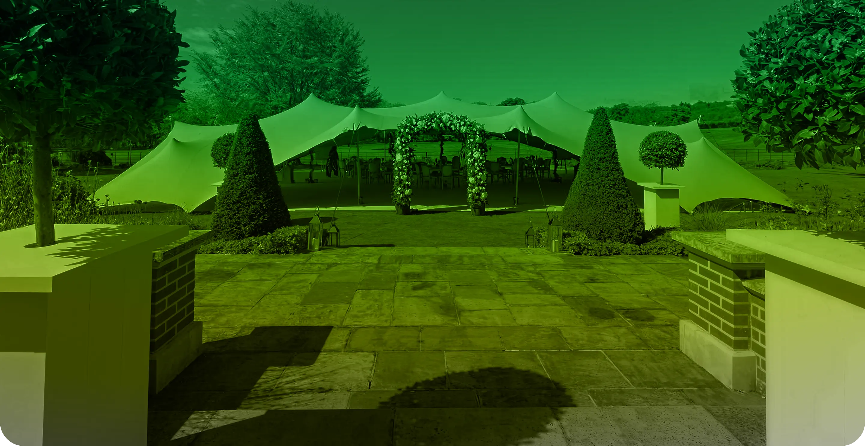 A green and black photo of a park.